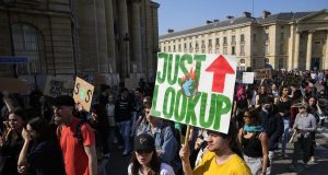 Activists stage global climate protest, slam Ukraine war