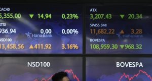 Asian shares rise ahead of Fed decision on rate hike.