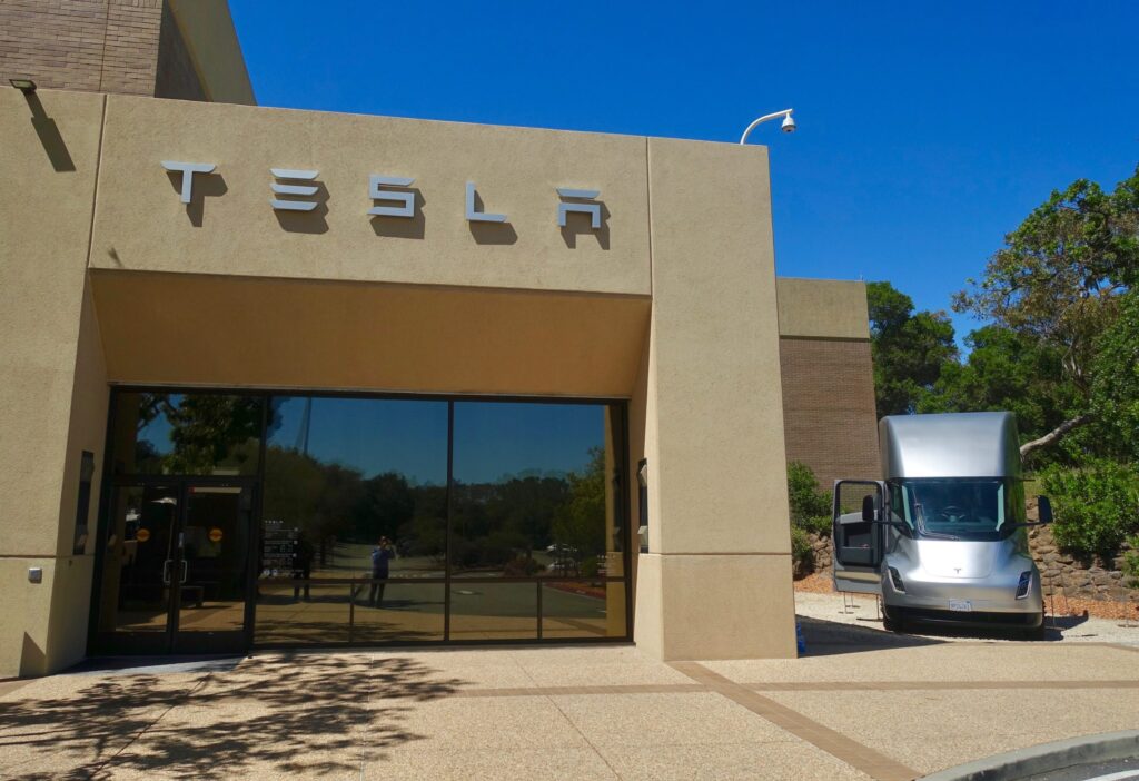 Tesla Semi electric truck parked outside Giga Nevada factory, ready for freight transport