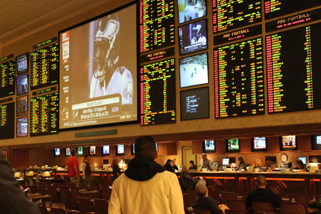 Modern Sports Bar Crowd Betting